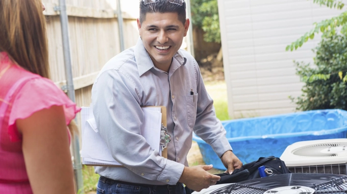 HVAC dealer with a customer