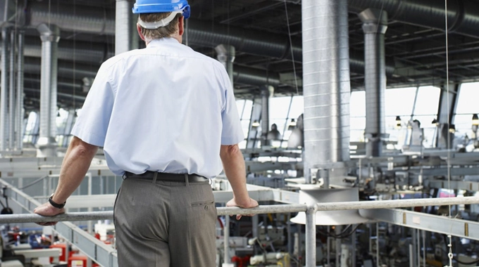 A manager watching over his employees